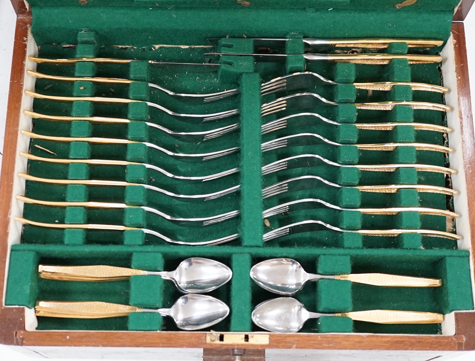 A 1960's parcel gilt canteen of cutlery, 40cm wide